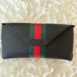 Gucci sunglass case, black with red and green stripes. Minor scratch on back
